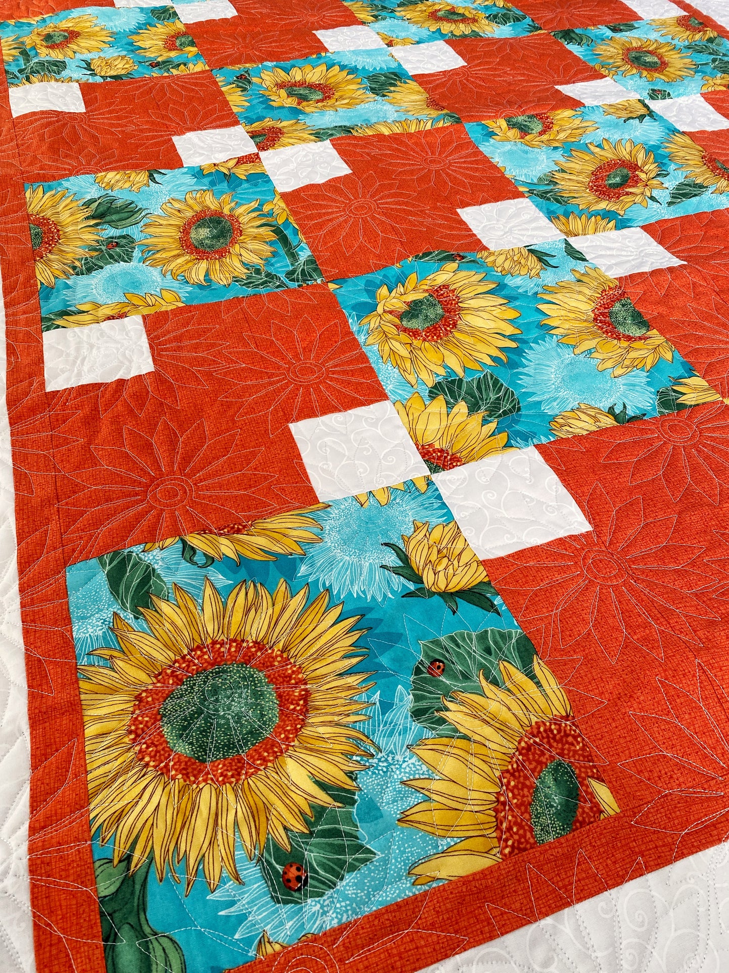 Sunflower and Christmas Quilts